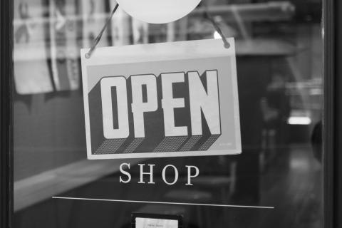 Photo of 'Open shop' sign by Mike Petrucci on Unsplash
